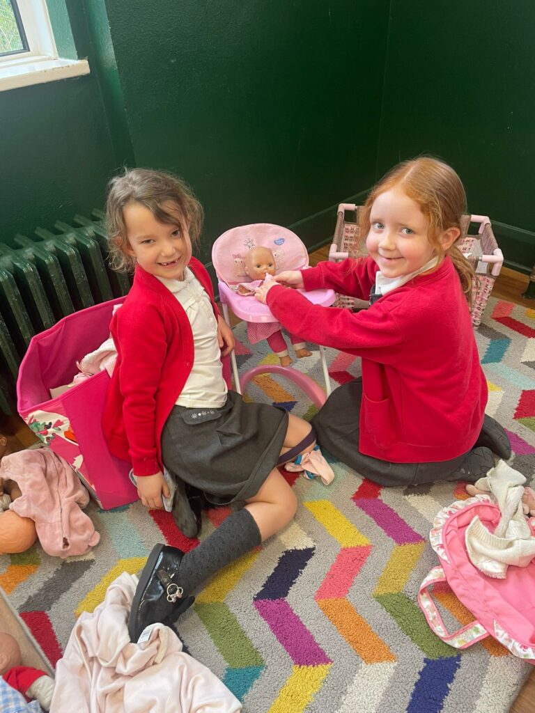 Playing with dolls